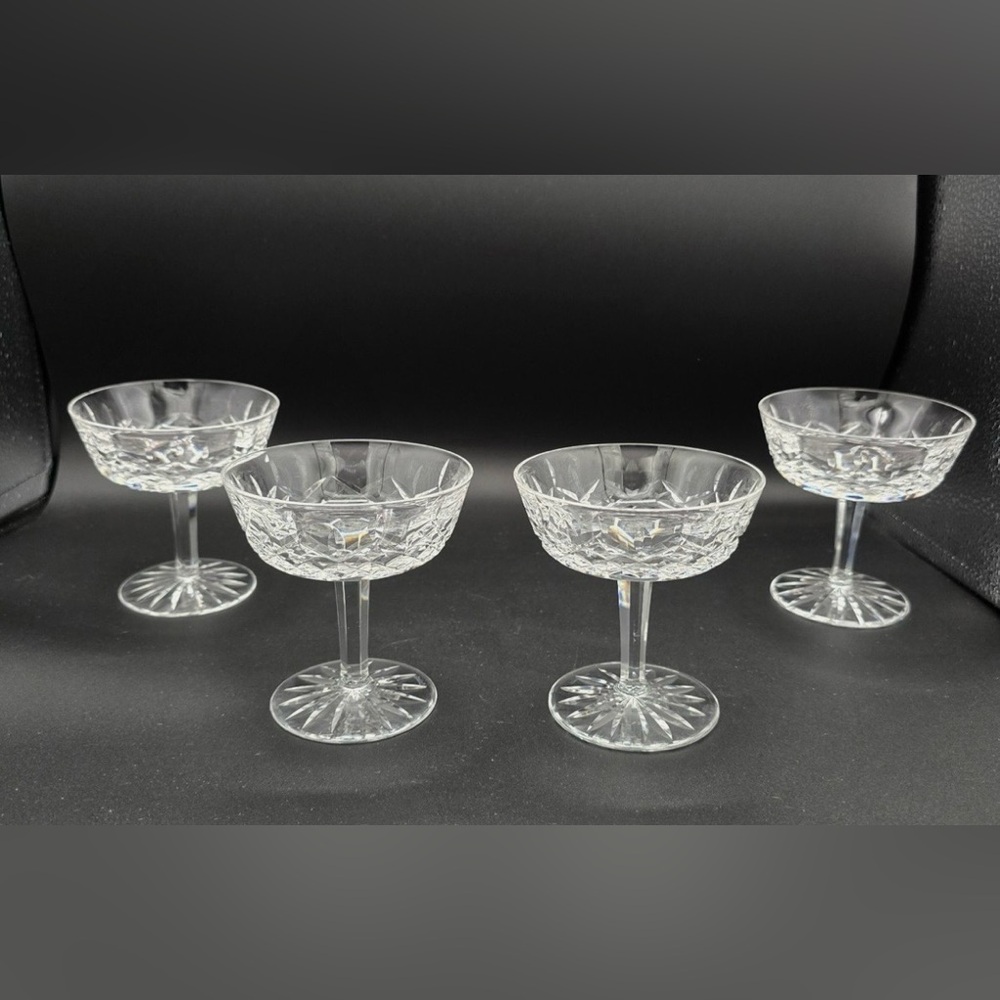 Set of four Waterford Crystal Lismore Champagne
glasses